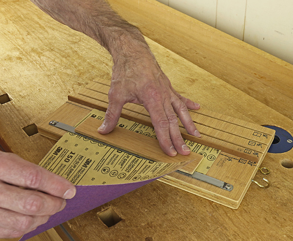 sandpaper cutter in use